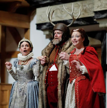 Falstaff wearing antlers with the two Merry Wives