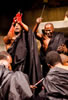 The conspirators are in black togas, and Soothsayer kneeling on a platform behind the mob.