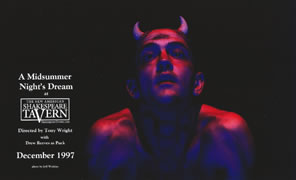 Poster of A Midsummer Night's Dream at the Shakespeare Tavern with a picture of Drew Reeves as Puck, tiny horns on his head, coming out of the darkness in a red light