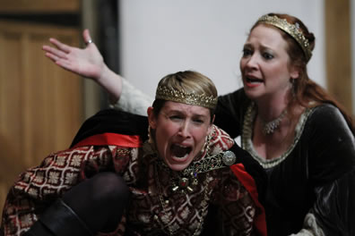 Production picture of Margaret shouting at a crying Henry
