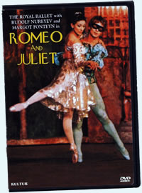 DVD cover of Nureyev in blue and a black masque danicing with Fonteyne in gold dress