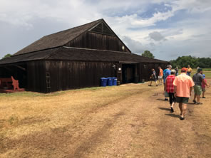 Photo of people walking up to the Barn