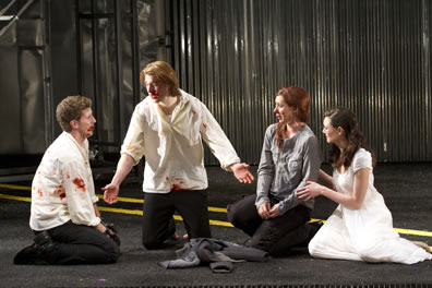 The two couples, bloodied, after the big brawl in the play's last scene