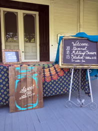 Photo of Sweet Tea signs on Poe House porch