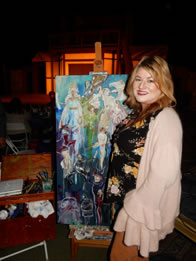Photo of Lisa Owen with Painting
